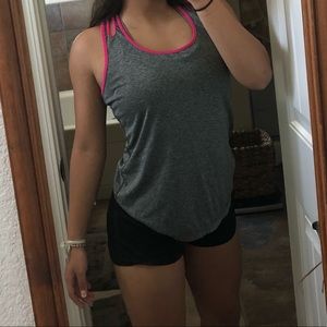2 tanks tops and 1 shirt from various brands